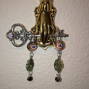 Vibrant Paisley Drop Earrings with Green Accents